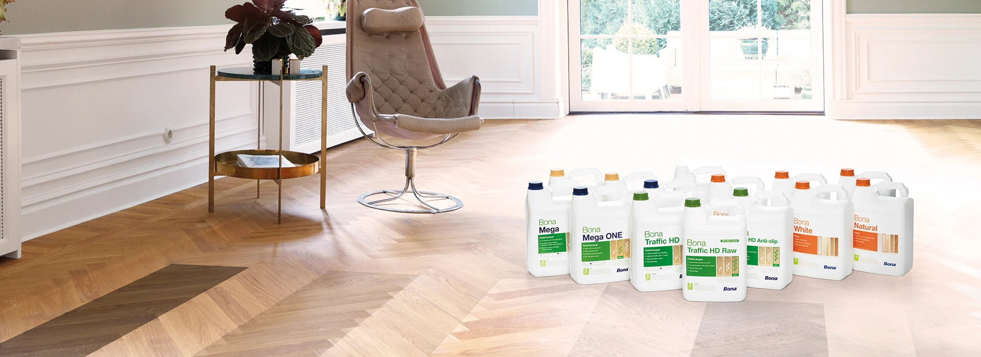Selection of Bona wood floor finishes displayed on sanded herringbone flooring after a Professional Wood Floor Sanding project in Catford.