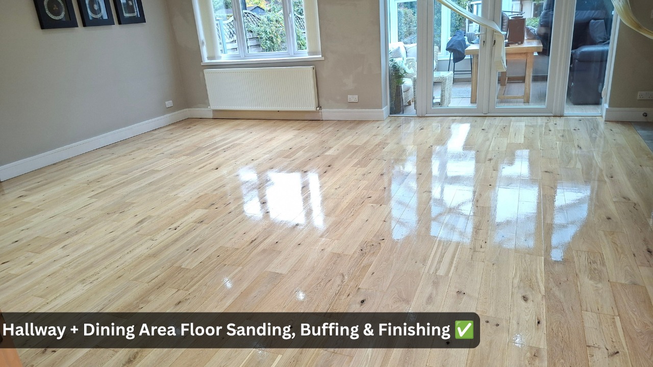 Freshly sanded, buffed and finished oak wooden floor in a bright hallway and dining area with high-gloss reflective finish